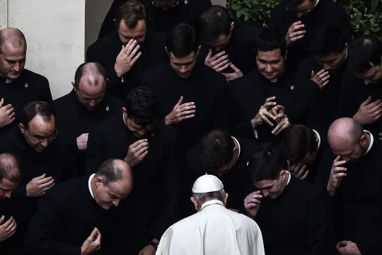 Pope Francis blesses priests during a limited public audience at the San Damaso courtyard in The Vatican on September 30, 2020 during the COVID-19 infection, caused by the novel coronavirus. Filippo Monteforte / AFP