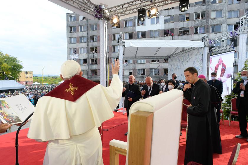 This handout photo taken and provided by the Vatican press office, the Vatican Media, on September 14, 2021 shows Pope Francis waving during a visit to Lunik IX district in Kosice that houses the largest community of Romani people in Slovakia. The Pope is on a four-day visit in Slovakia, where he will meet with Holocaust survivors and members of the Roma community.