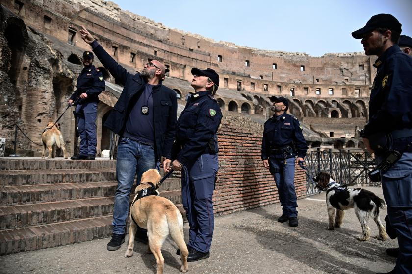 Canine unit police officers and dogs check for explosives inside the Colosseum prior to the Via Crucis procession led by the Pope, on Holy Friday in Rome, Italy, 29 March 2024. EPA/RICCARDO ANTIMIANI