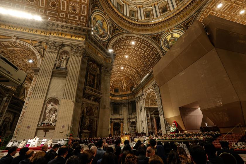 Pope Francis (L-C) presides over a Holy Mass toÂ Easter Vigil in the Holy Night of EasterÂ at Saint Peter's Basilica in Vatican City, 30 March 2024. EPA/GIUSEPPE LAMI