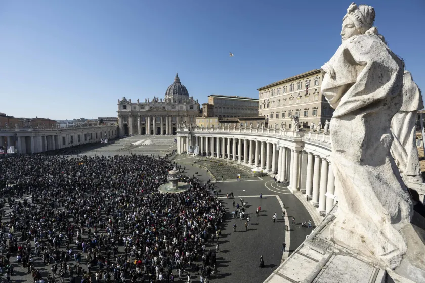 A handout photo made available by the Vatican Media shows faithful gathered to listen to Pope Francis as he leads the Angelus prayer from his office window overlooking St. Peter's Square at the Vatican, 18 February 2024. 