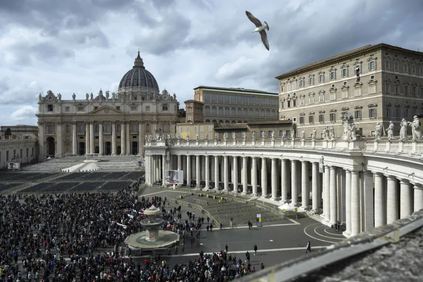 A handout photo made available by the Vatican Media shows faithful gathered at St. Peter's Square to listen to Pope Francis leading his Angelus prayer from the window of his office, at the Vatican City, 03 March 2024. 